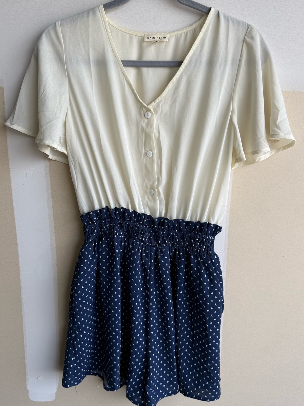Main Strip Cream Top with Navy Patterned Skirted Romper